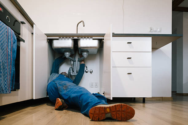 Professional Emergency Plumber technician working in Bellefontaine, OH